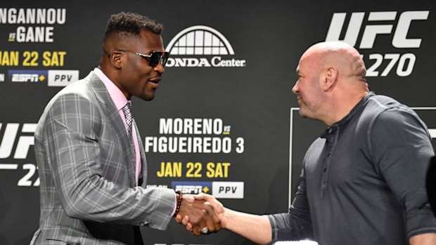 Francis Ngannou and UFC President Dana White shake hands.